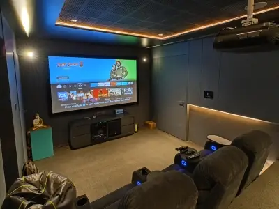 Audiophile speaker and AVR calibration for luxury home theater rooms.