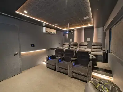 Custom home cinema installation in Jaipur with high-end surround speakers and projector.